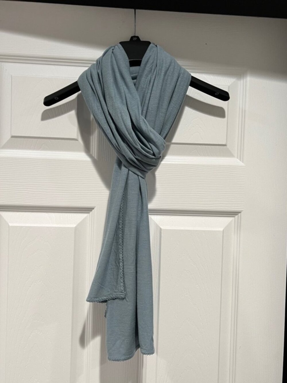 Gap scarf in light blue color approximately 80”x23”, 70% rayon, 30%tencel